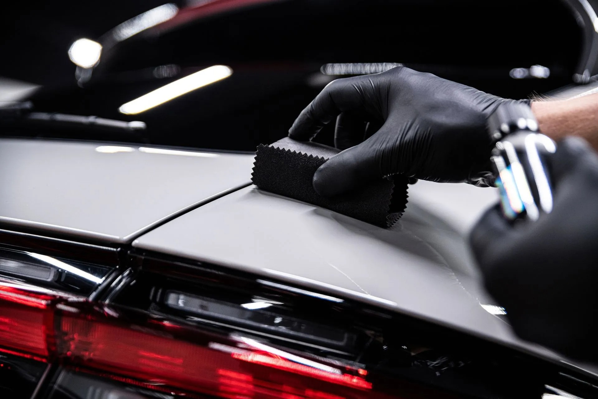Ceramic coating in Orlando, FL · applying three-layer protocol on vehicle paint · booking page