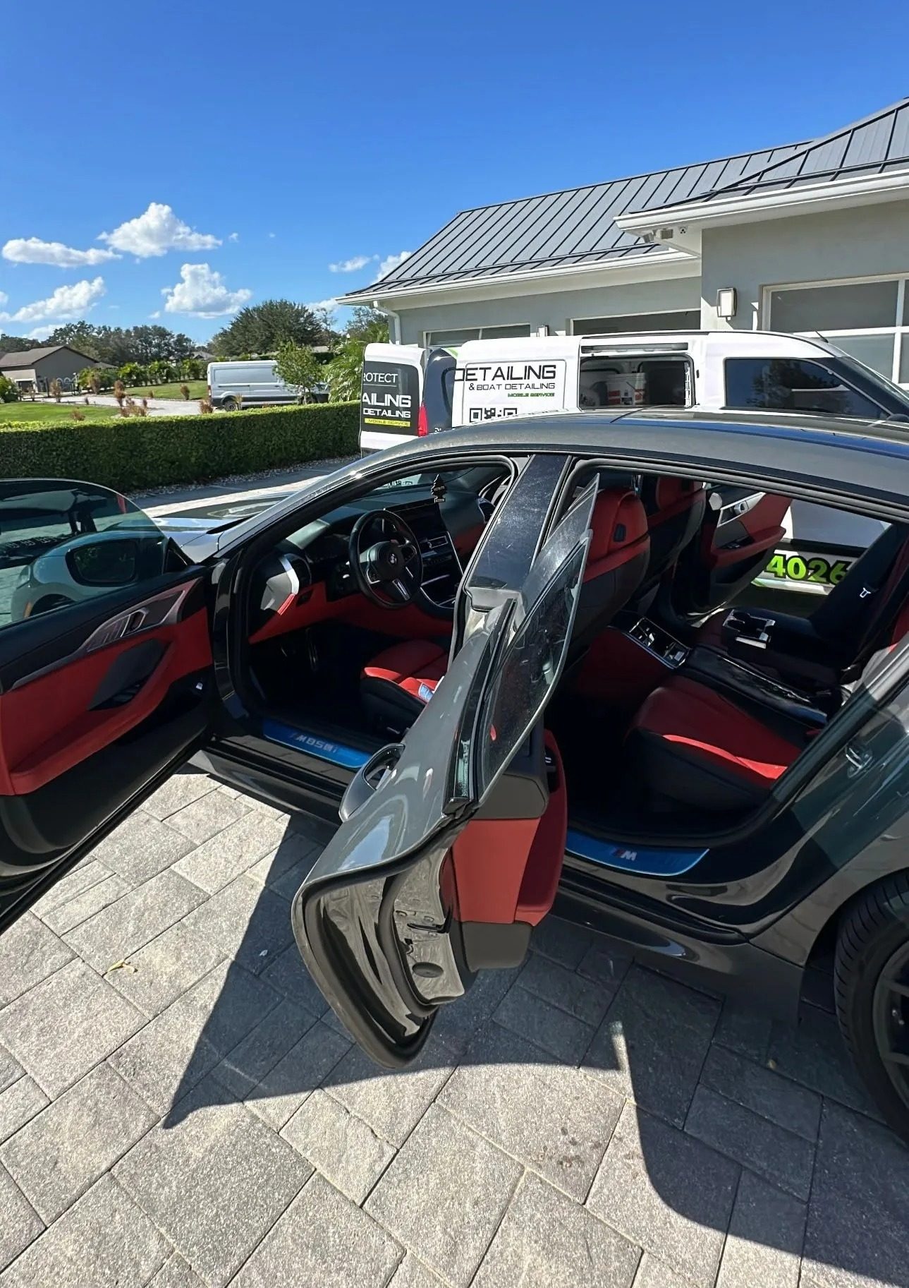 Mobile auto detailing in Orlando, FL · BMW foam wash at customer driveway · vinyl wrap page